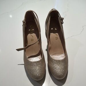 Gold sparkly heels
